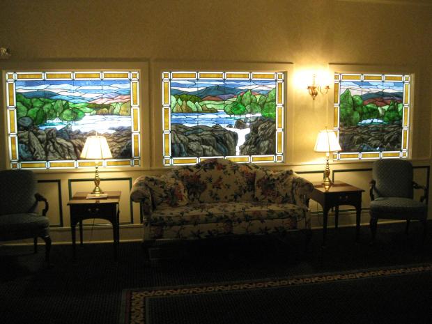 Elegant stained glass windows adorn our main reception area